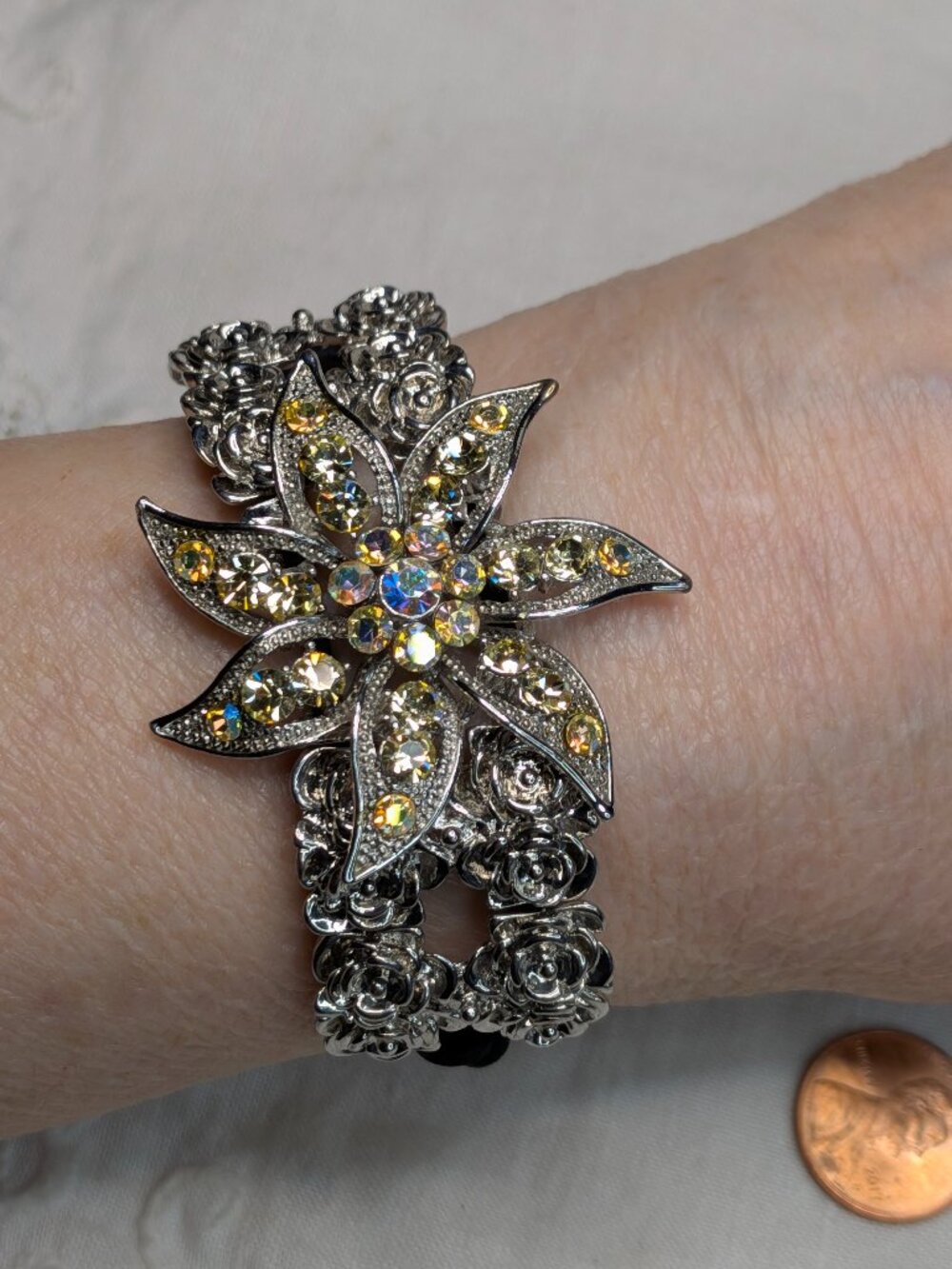 Silver Tone Rhinestone Flower Bracelet with AB Crystals on Black Stretch Cord